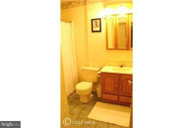 112 Gloucester Road Queenstown, MD 21658 - Photo 19 of 24 a bathroom with a sink and a toilet