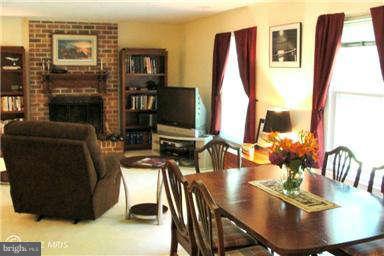 112 Gloucester Road Queenstown, MD 21658 - Photo 8 of 24 a view of a dining room with furniture