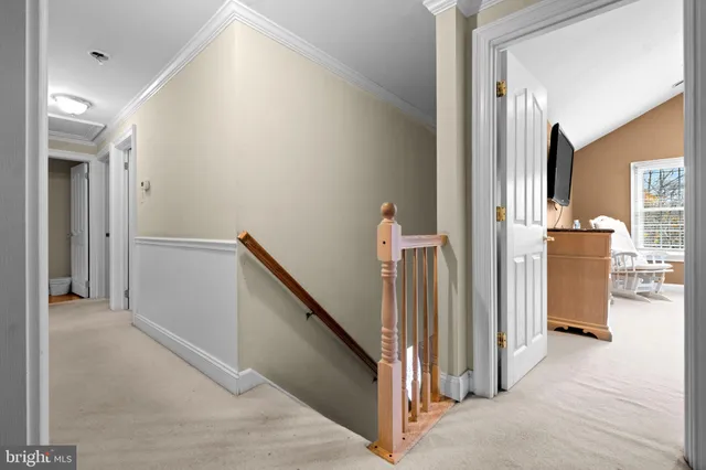 a bedroom with furniture and flat screen tv