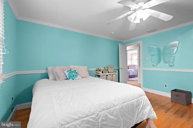 a view of a chair and table in the balcony