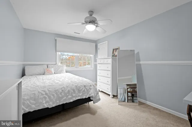 a view of a balcony with table and chairs