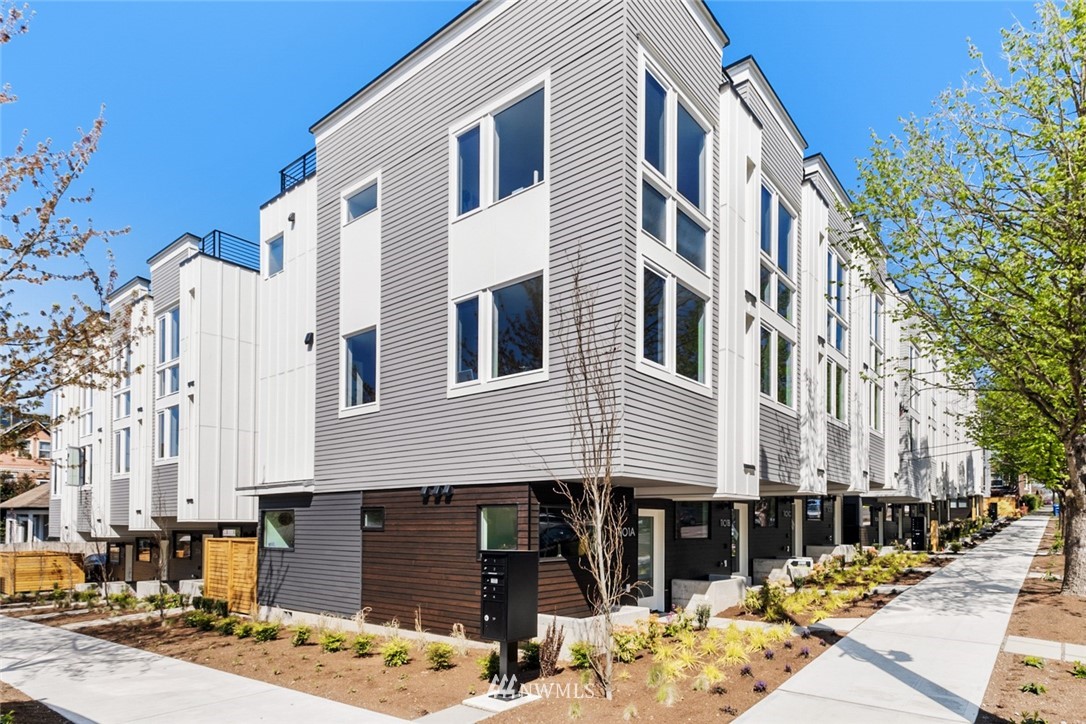 1324 East Spring Street Seattle, WA 98122 - Photo 1 of 29 a front view of a building with street