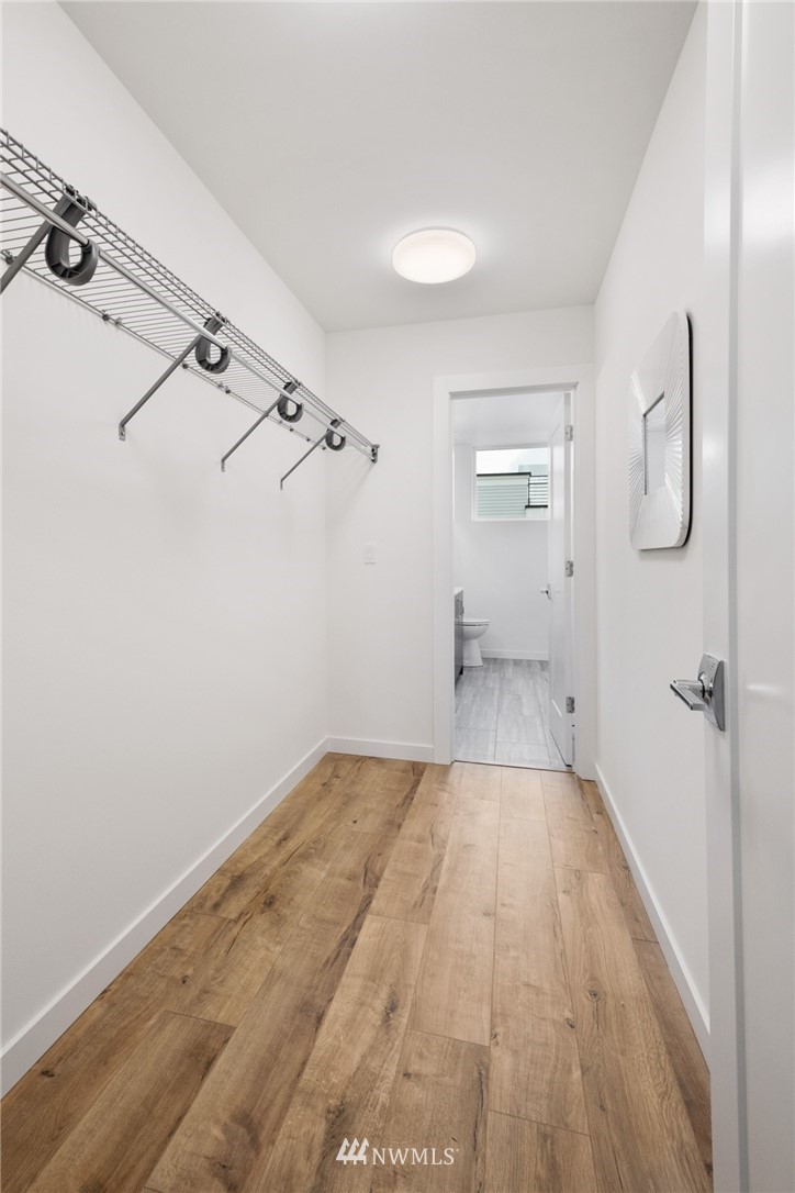 1324 East Spring Street Seattle, WA 98122 - Photo 22 of 29 a view of a room with racks on the wall