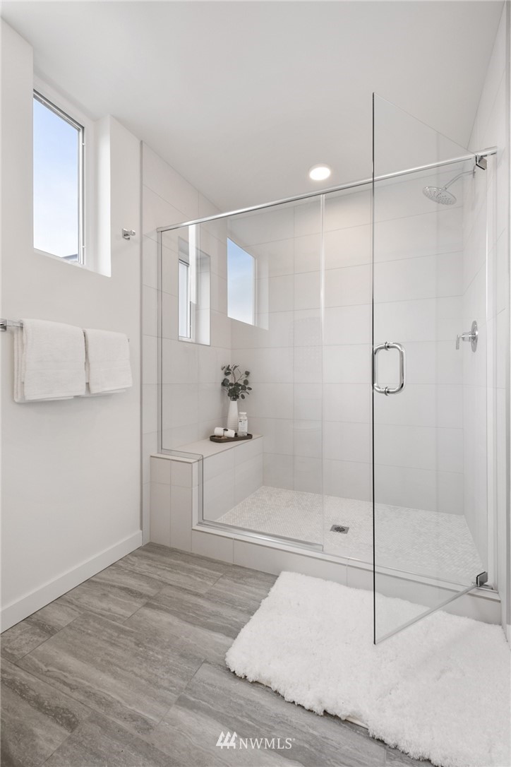 1324 East Spring Street Seattle, WA 98122 - Photo 24 of 29 a bathroom with a shower and a sink