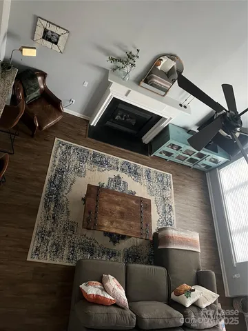 a living room with furniture and a rug