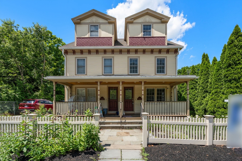 1844 Main Street, Unit 1 Concord, MA 01742 - Photo 33 of 36 front view of a house with a porch