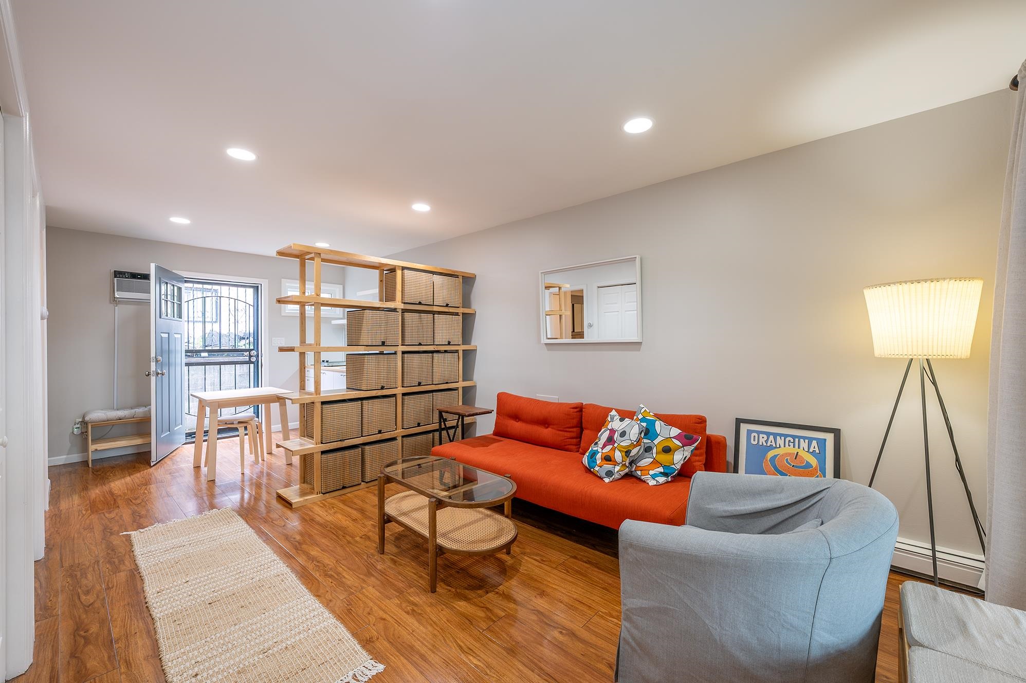 a living room with furniture and a table