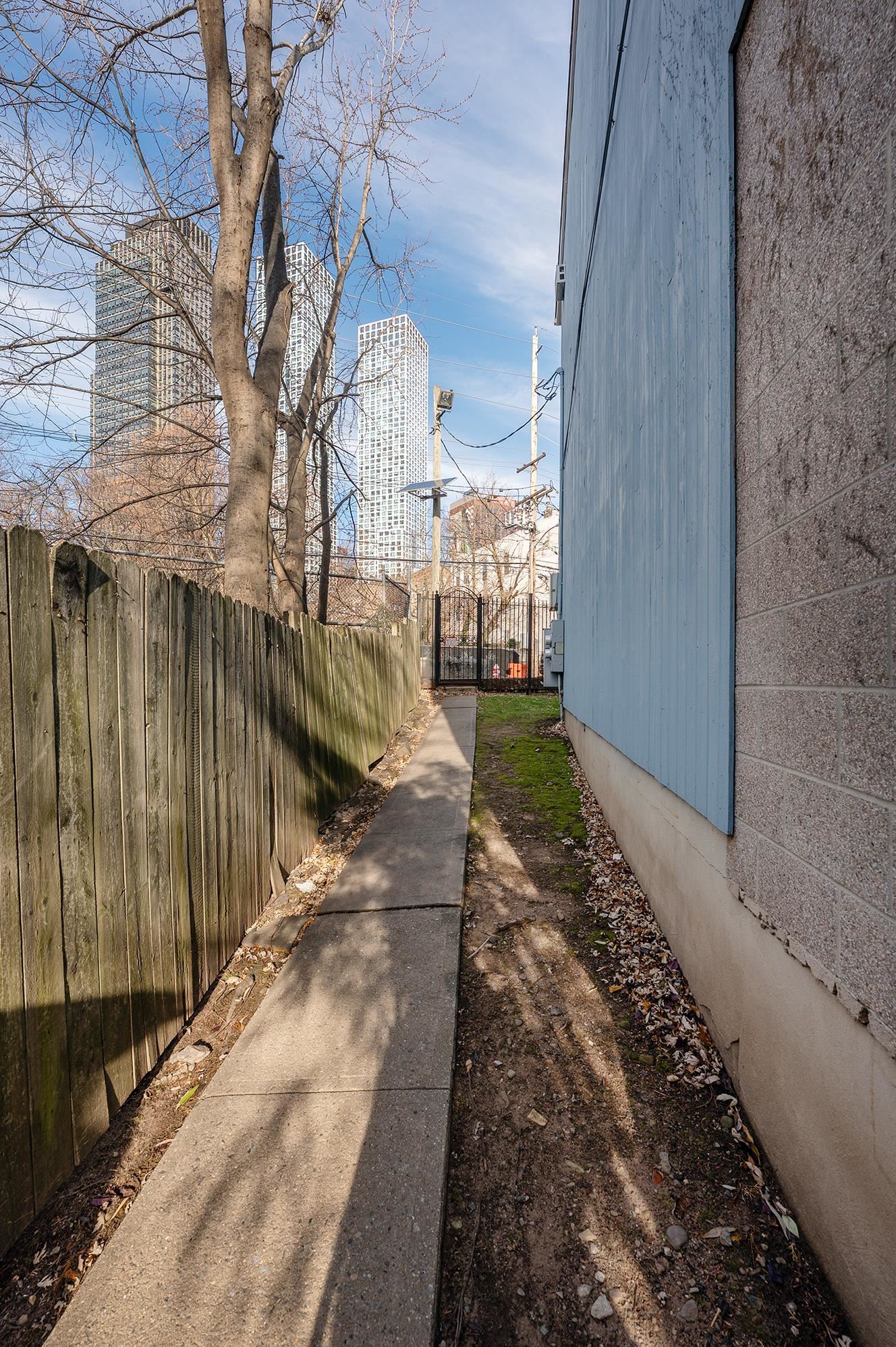 72 Henry Street, Unit 3AGARDEN Jersey City, NJ 07306 - Photo 12 of 13 a view of a pathway of a building