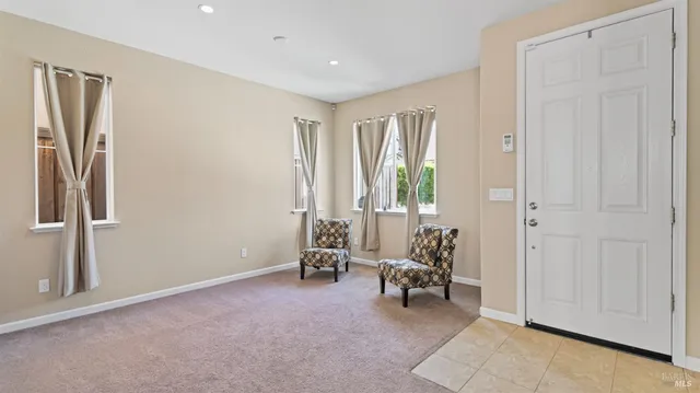 a view of room with furniture and entryway