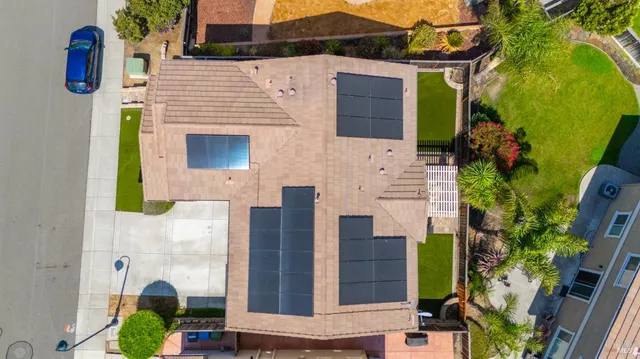 a front view of a house with outdoor space