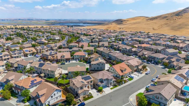 an aerial view of a city with lots of residential buildings