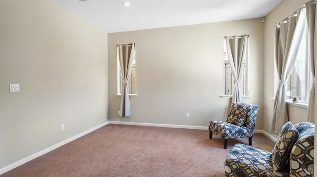 a room with furniture and a window