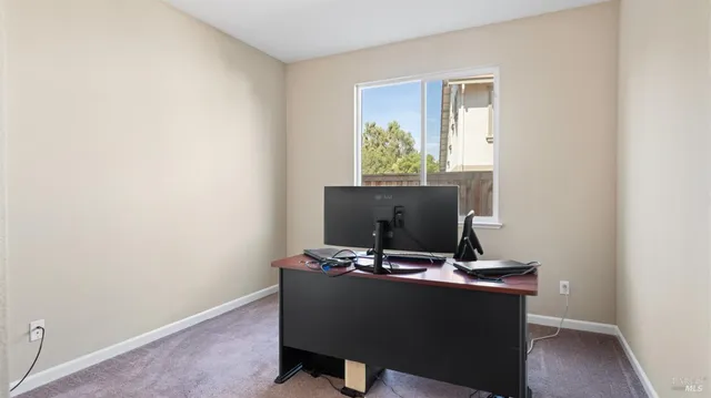 a room with furniture and a flat screen tv