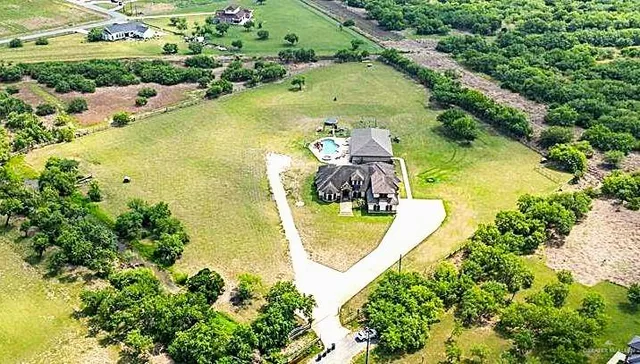 an aerial view of a swimming pool