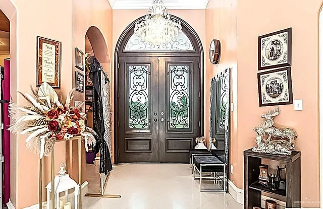 a view of livingroom with furniture window and front door
