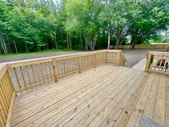 a view of a house with backyard