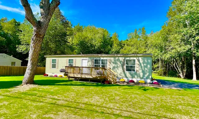 a view of a back yard of the house