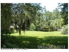 2807 Adams Road St. Augustine, FL 32092 - Photo 6 of 13 a view of outdoor space with deck and yard