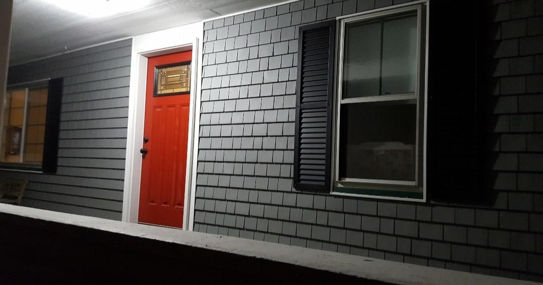 242 Goshen Road Winterport, ME 04496 - Photo 6 of 30 porch night w new siding