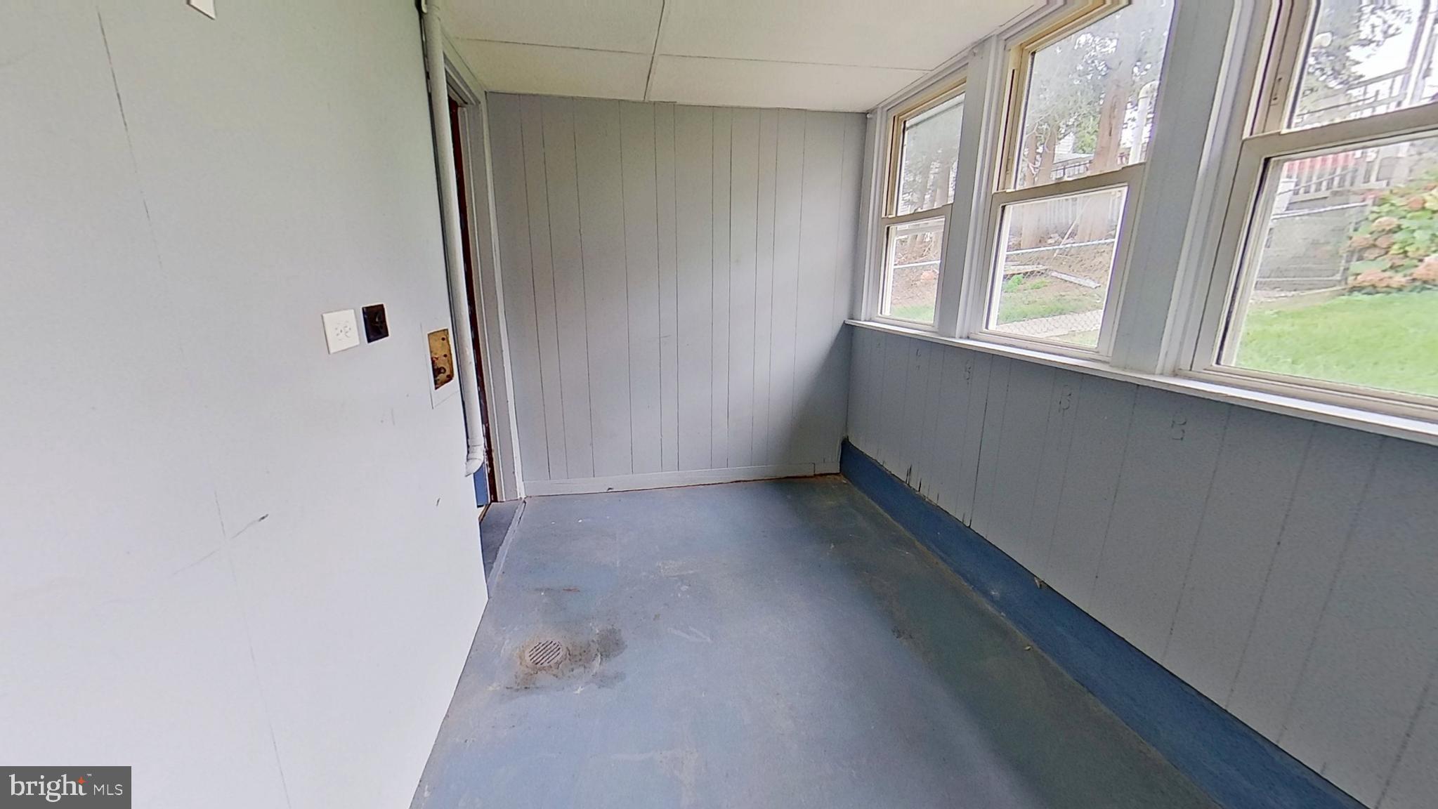 8 Henrietta Street Red Lion, PA 17356 - Photo 3 of 7 a view of an empty room with a window