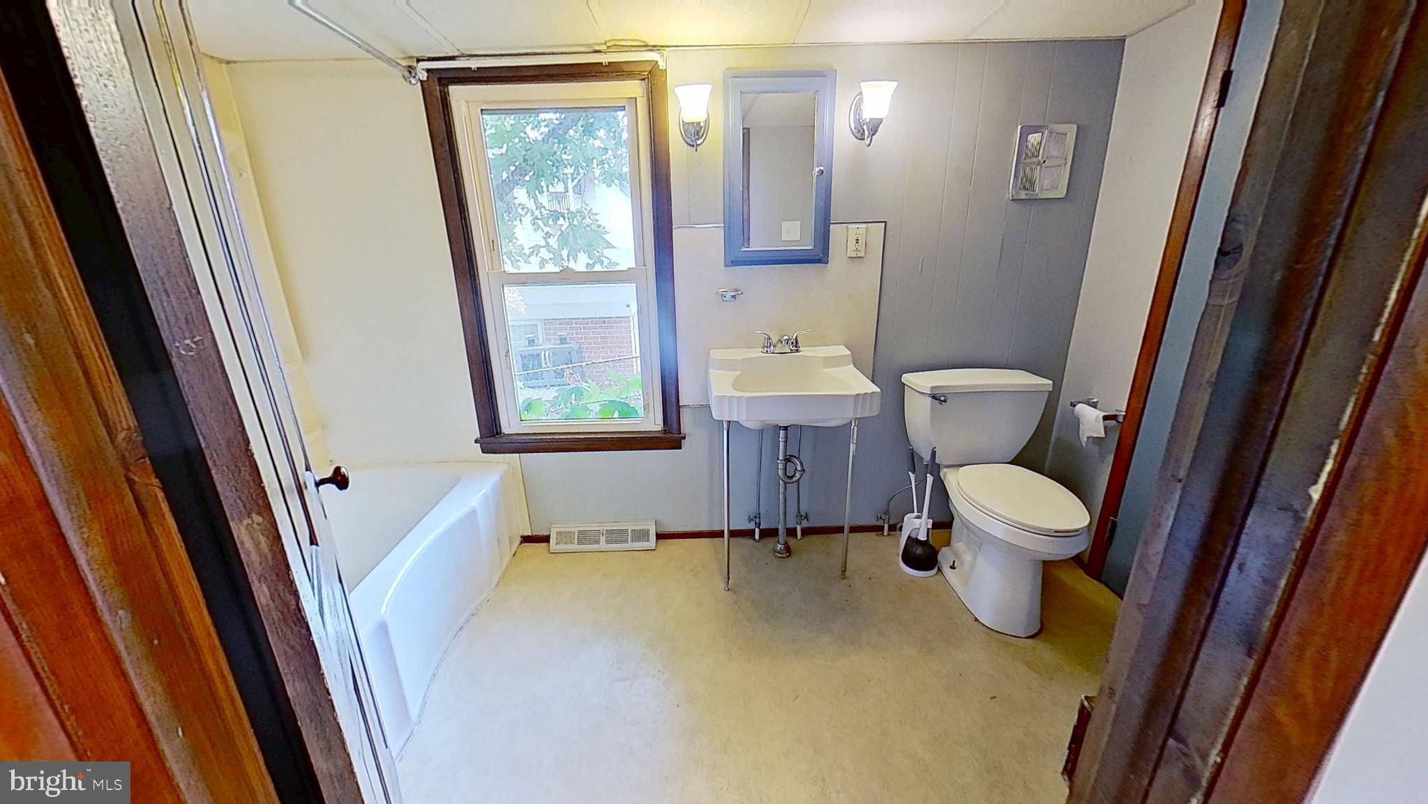 8 Henrietta Street Red Lion, PA 17356 - Photo 4 of 7 a bathroom with a sink and a mirror