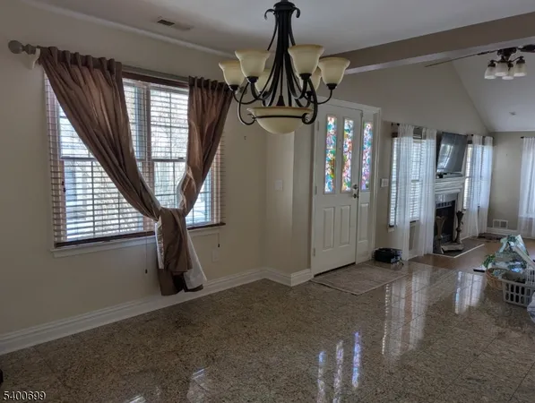 a view of entryway and livingroom