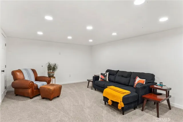 a view of a balcony with wooden floor