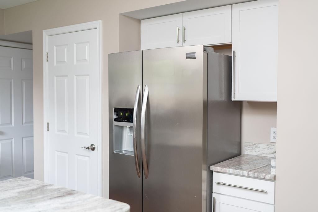 26 Long Bow Road Waynesboro, VA 22980 - Photo 18 of 72 a metallic refrigerator freezer sitting in a kitchen