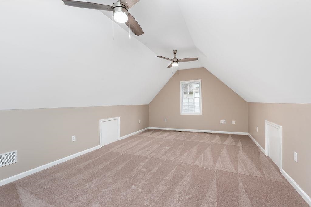 26 Long Bow Road Waynesboro, VA 22980 - Photo 42 of 72 a view of a big room with windows and ceiling fan