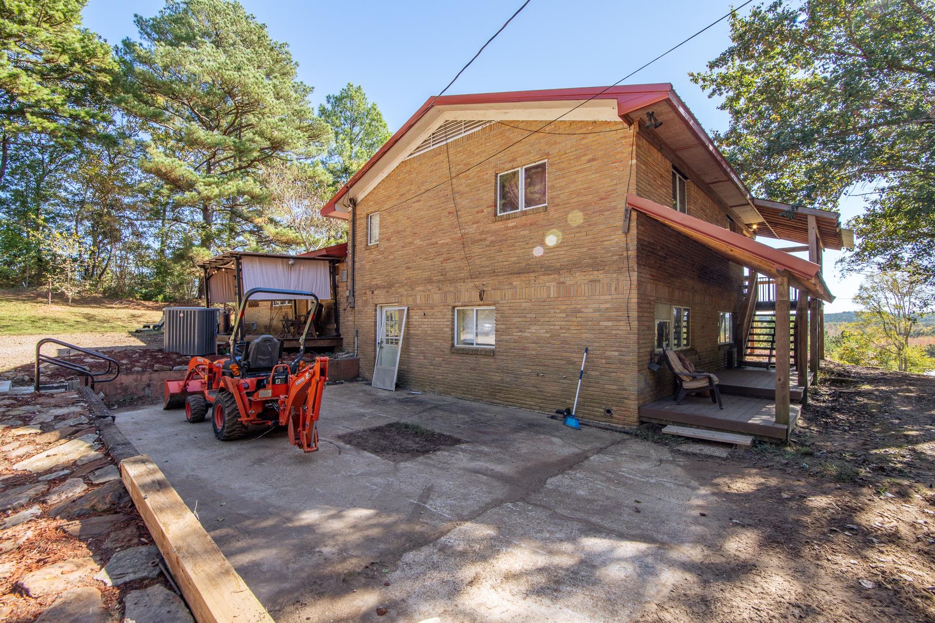 3540 Damon Road Michie, TN 38357 - Photo 23 of 40 a view of a house with a patio