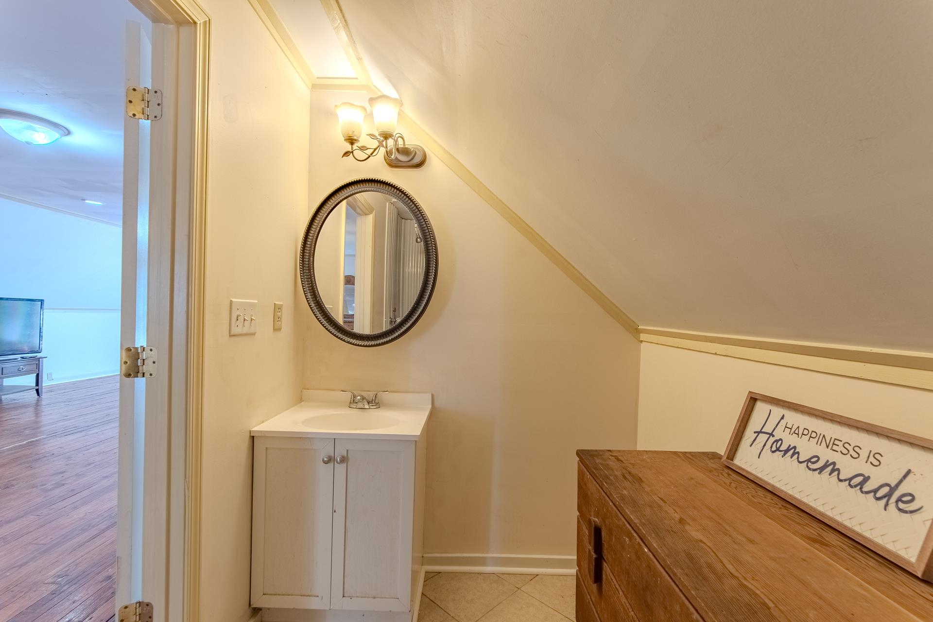 3540 Damon Road Michie, TN 38357 - Photo 29 of 40 a bathroom with a sink and a mirror