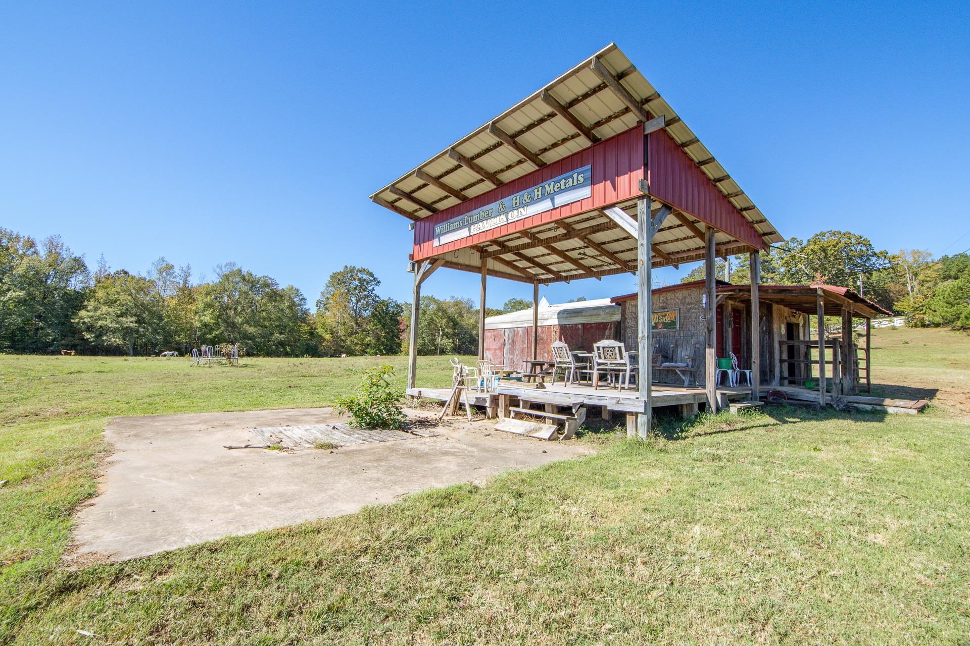 3540 Damon Road Michie, TN 38357 - Photo 30 of 40 a view of a house with a yard porch and sitting area