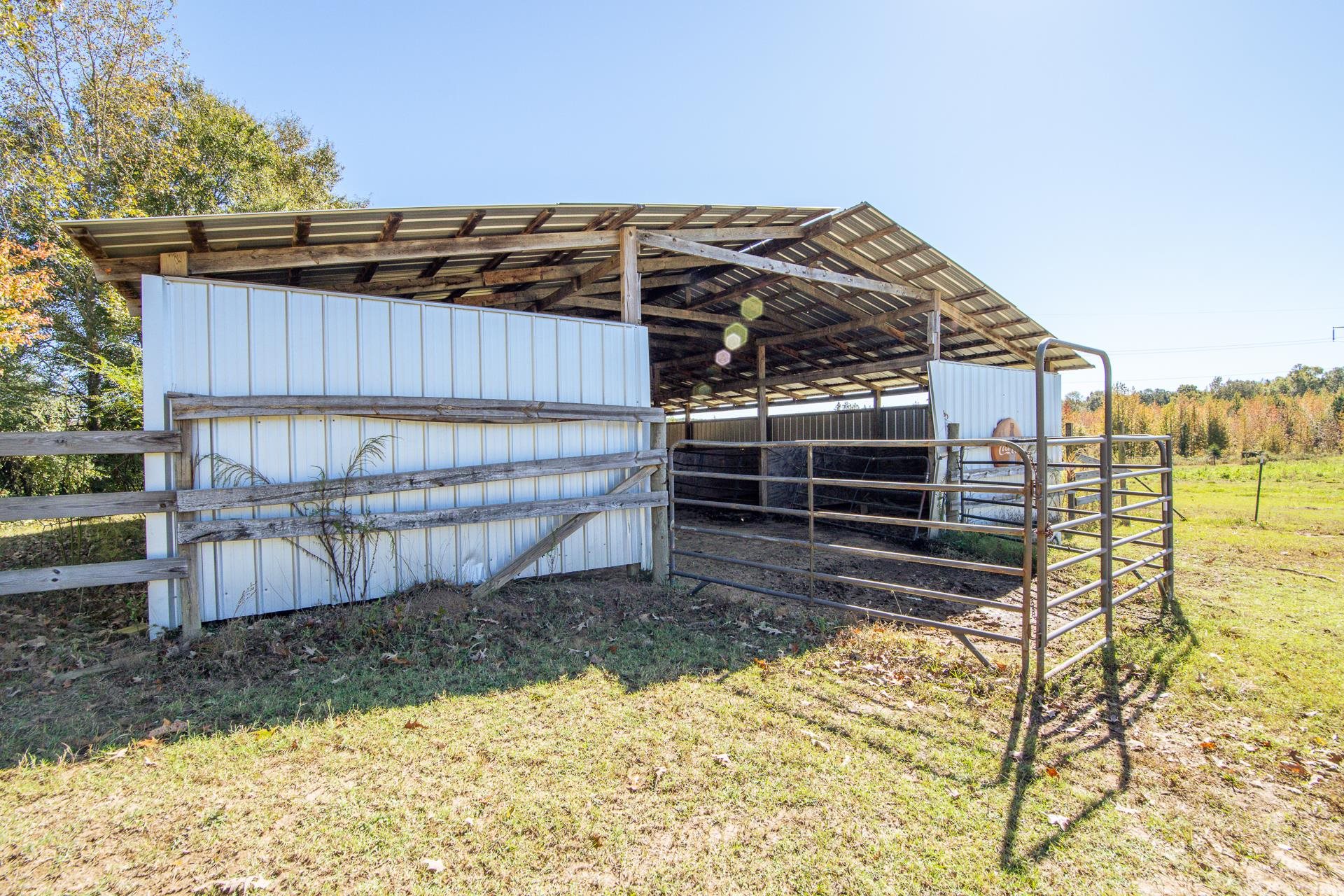 3540 Damon Road Michie, TN 38357 - Photo 31 of 40 a view of a backyard with a wooden fence