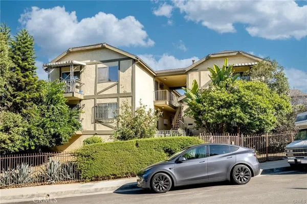 a car parked in front of a house