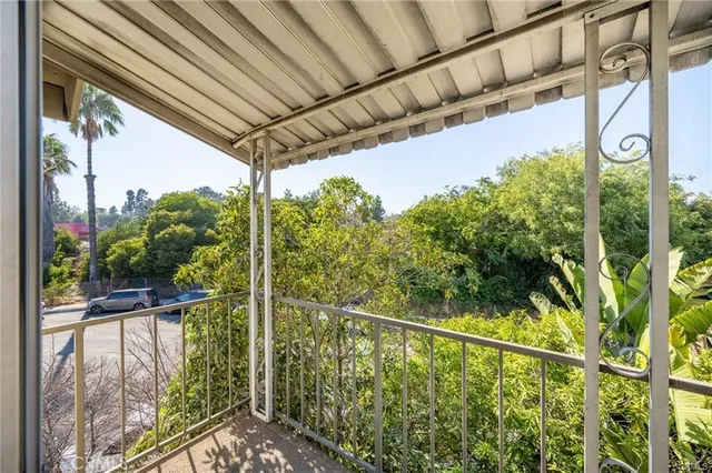 a kitchen with stainless steel appliances a refrigerator and a stove top oven