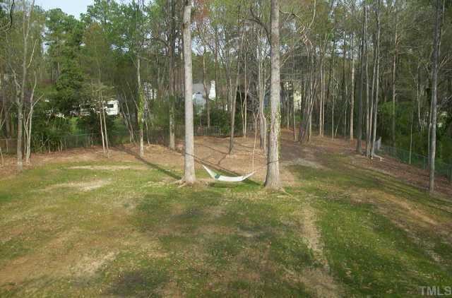 7405 Baystone Court Raleigh, NC 27615 - Photo 9 of 10 a view of outdoor space and yard