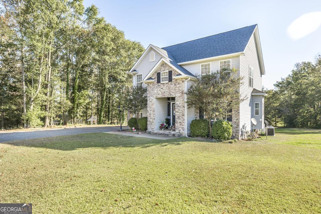 1550 Charlie Benson Road Forsyth, GA 31029 - Photo 3 of 51