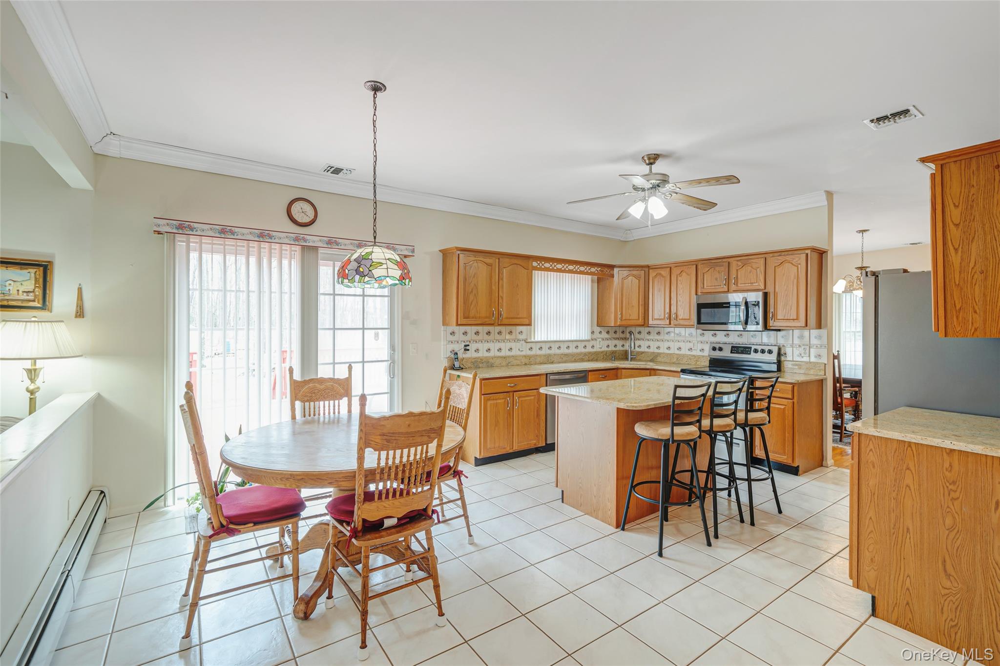 22 Jerusalem Hollow Road Manorville, NY 11949 - Photo 16 of 46 Kitchen with fresh neutral paint