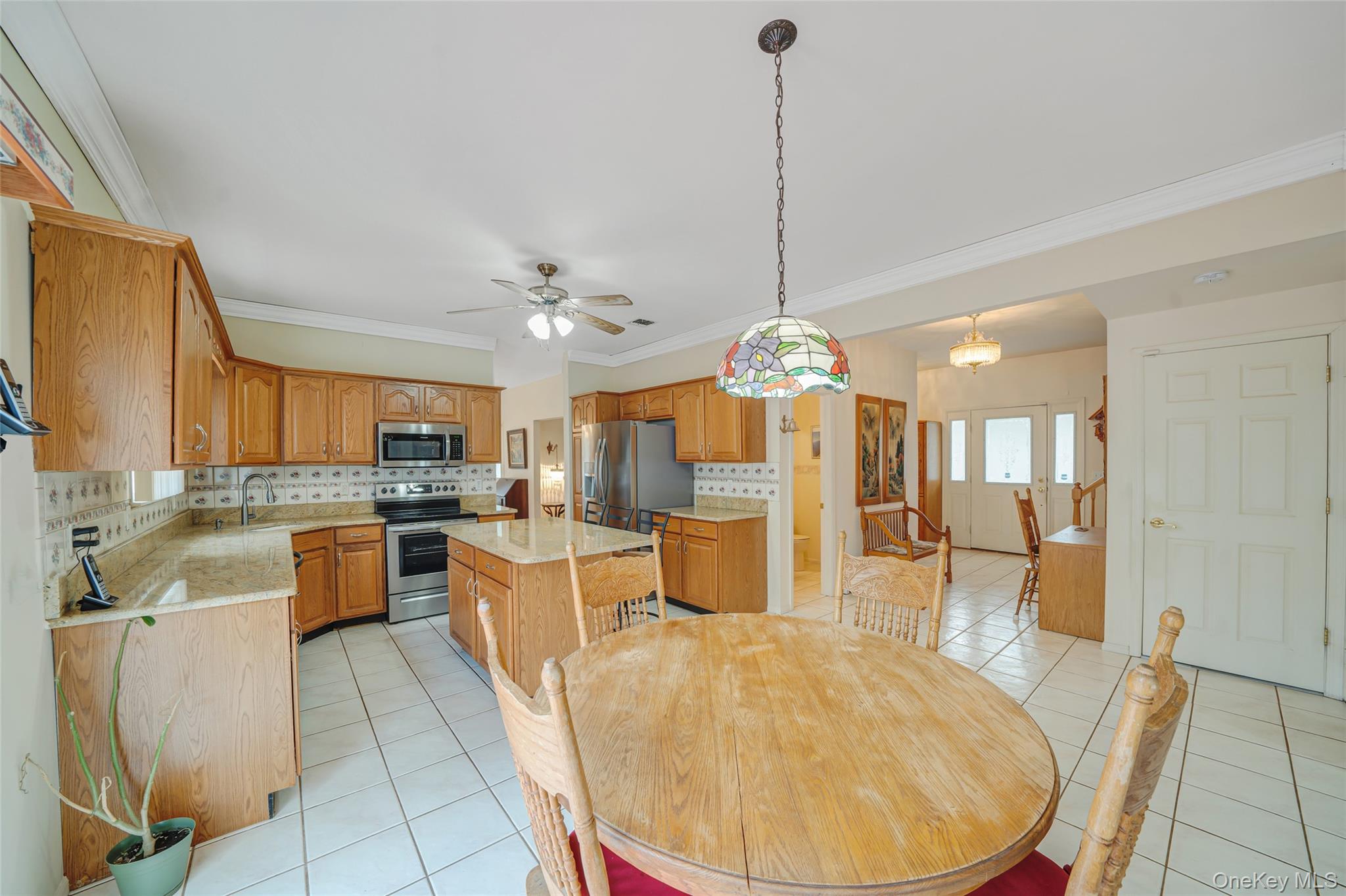 22 Jerusalem Hollow Road Manorville, NY 11949 - Photo 17 of 46 Kitchen with fresh neutral paint