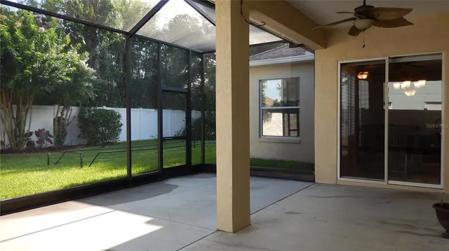 a view of a porch with a backyard