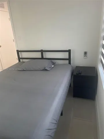 a bathroom with a toilet and shower