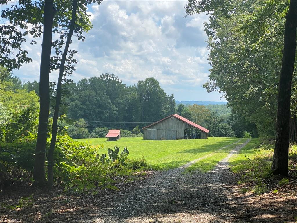 338 Key Road Ararat, NC 27007 - Photo 3 of 30 A picturesque view from the house down to the barn and Key Road.