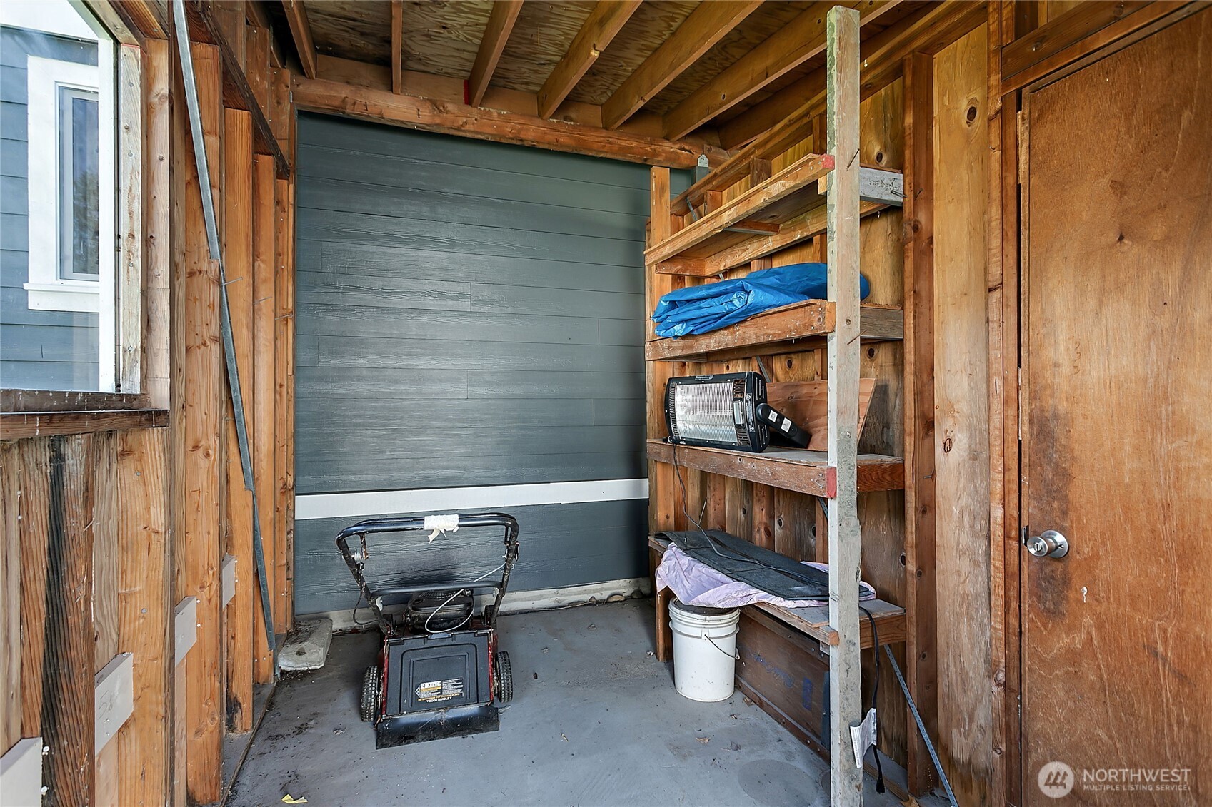 921 Autumn Lane, Unit 243 Bellingham, WA 98229 - Photo 17 of 24 a room with furniture and a window