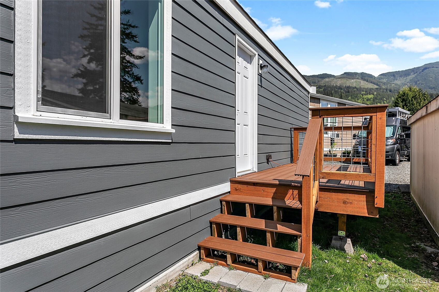 921 Autumn Lane, Unit 243 Bellingham, WA 98229 - Photo 18 of 24 a backyard of a house with seating space