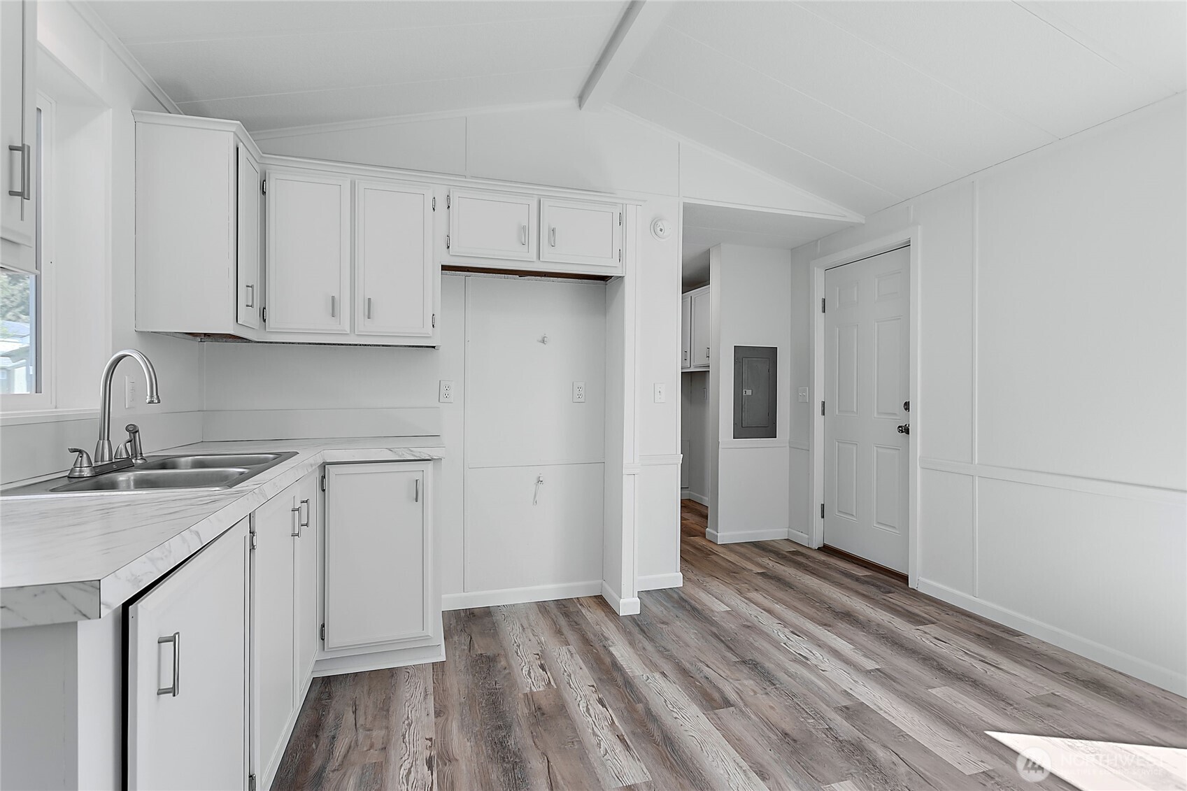 921 Autumn Lane, Unit 243 Bellingham, WA 98229 - Photo 10 of 24 a kitchen with a sink stove and cabinets