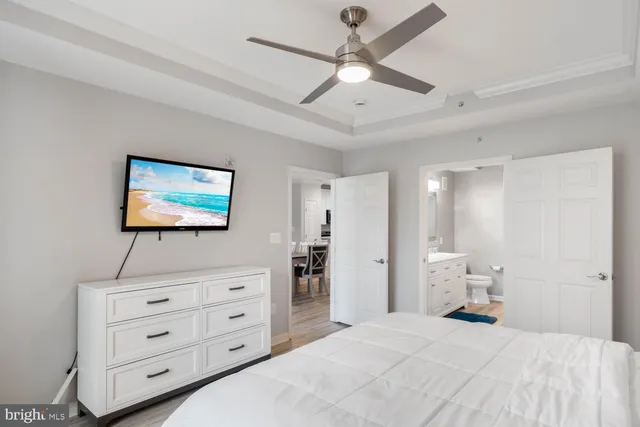 a bedroom with a bed and a dresser