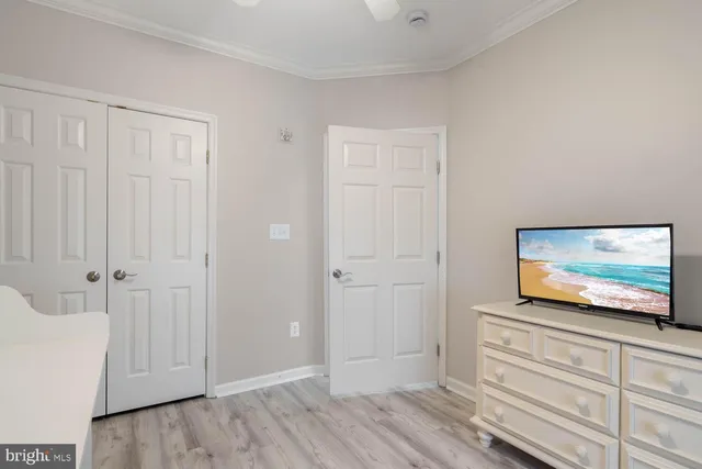 a view of a balcony with wooden floor and outdoor space