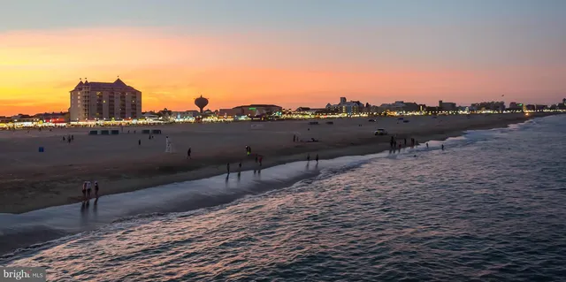 a view of a balcony with an outdoor seating
