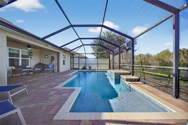 a view of a patio with wooden floor