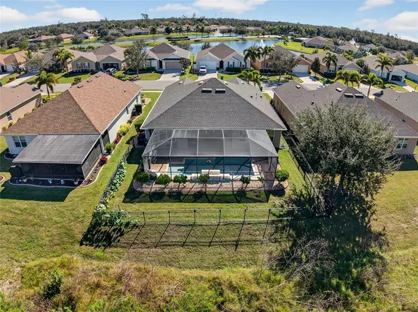 an aerial view of a house with a garden